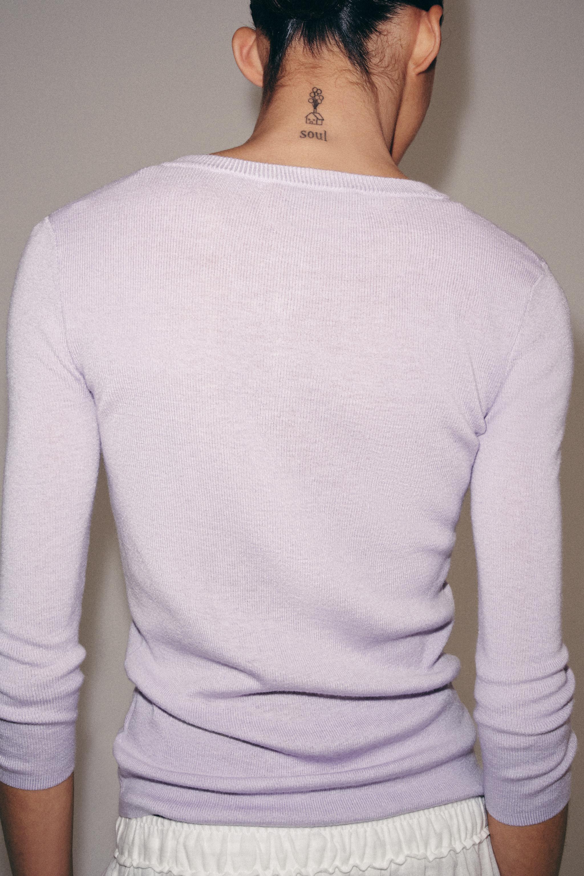 PULL EN MAILLE À BOUTONS